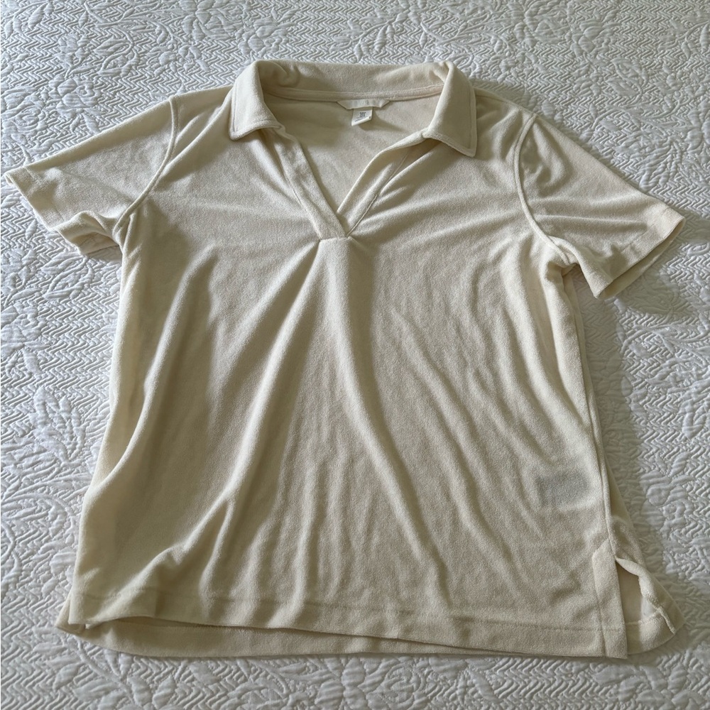 Cream colored H&M terry cloth shirt.